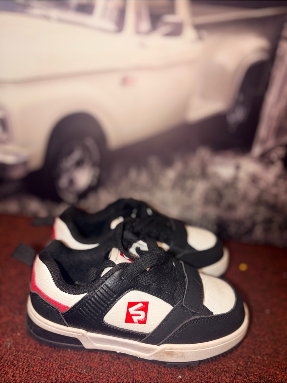Kids Black and White Sneakers with Red Logo Accent